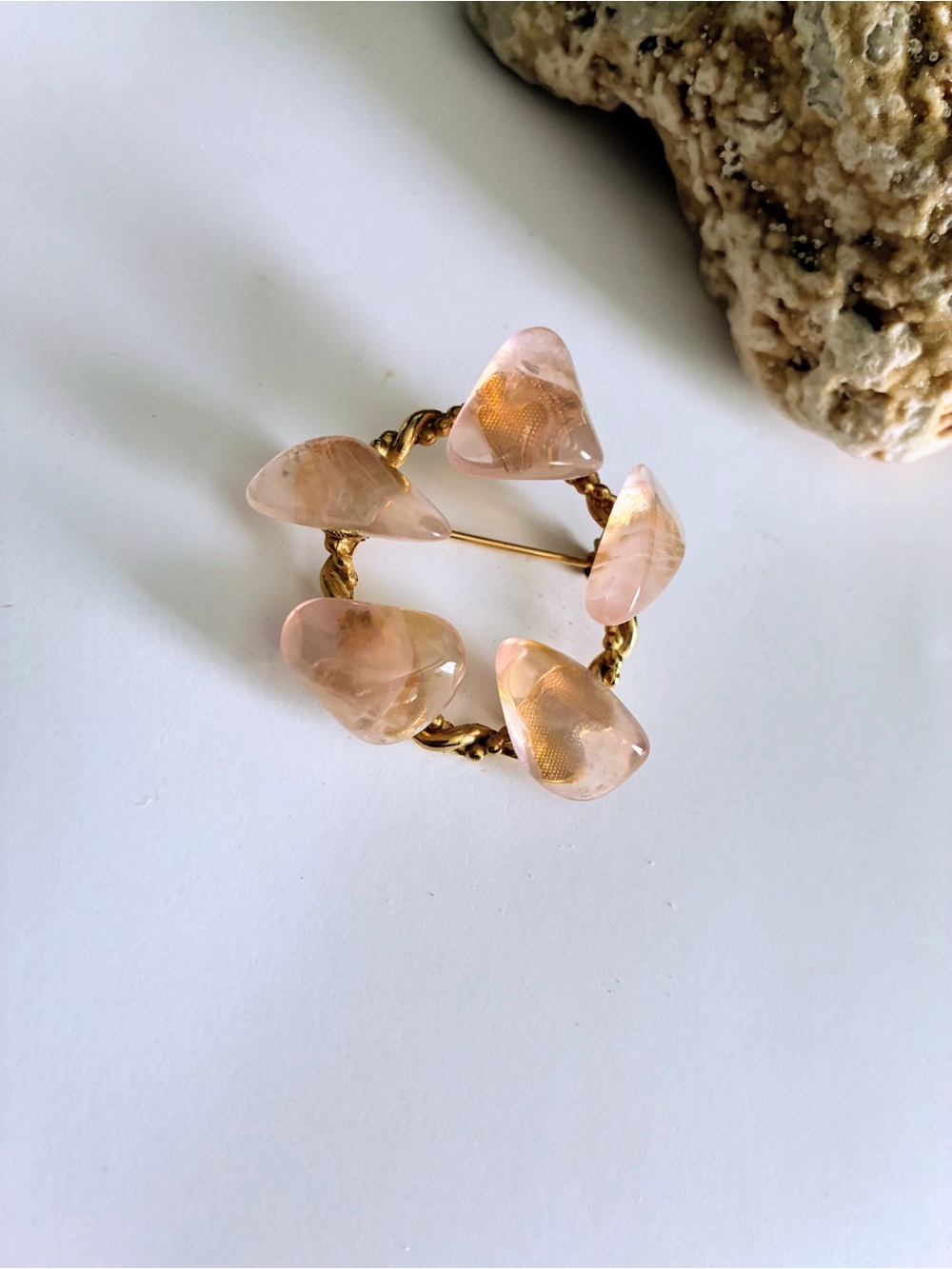 Pink rose quartz brooch with gold-tone metal and five teardrop-shaped pieces #st